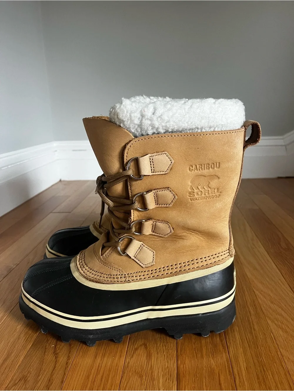 Sorel Tan and Black Caribou Winter Boots